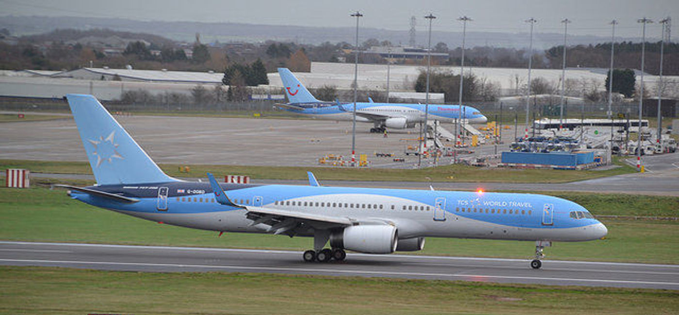 Image: PHOTO: A Boeing 757 with TCS World Travel livery on the tarmac. (photo via Flickr/Alec Wilson)