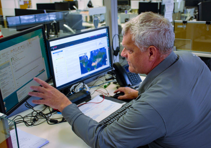 Harding Bush in Global Rescue operations center