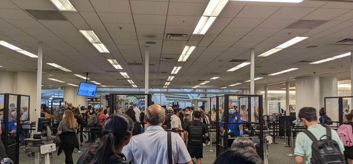 Image: Waiting to check in at with TSA security at the airport (photo by Eric Bowman)