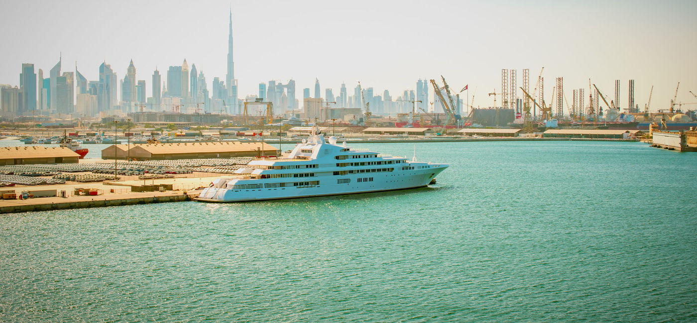Image: PHOTO: Luxury ship docked in the port of Dubai. (Photo via iStock / Getty Images Plus / NAPA74)