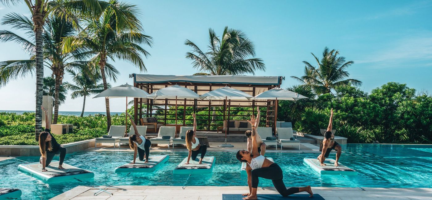 Image: Yoga in the pool. (photo via UNICO 2087)