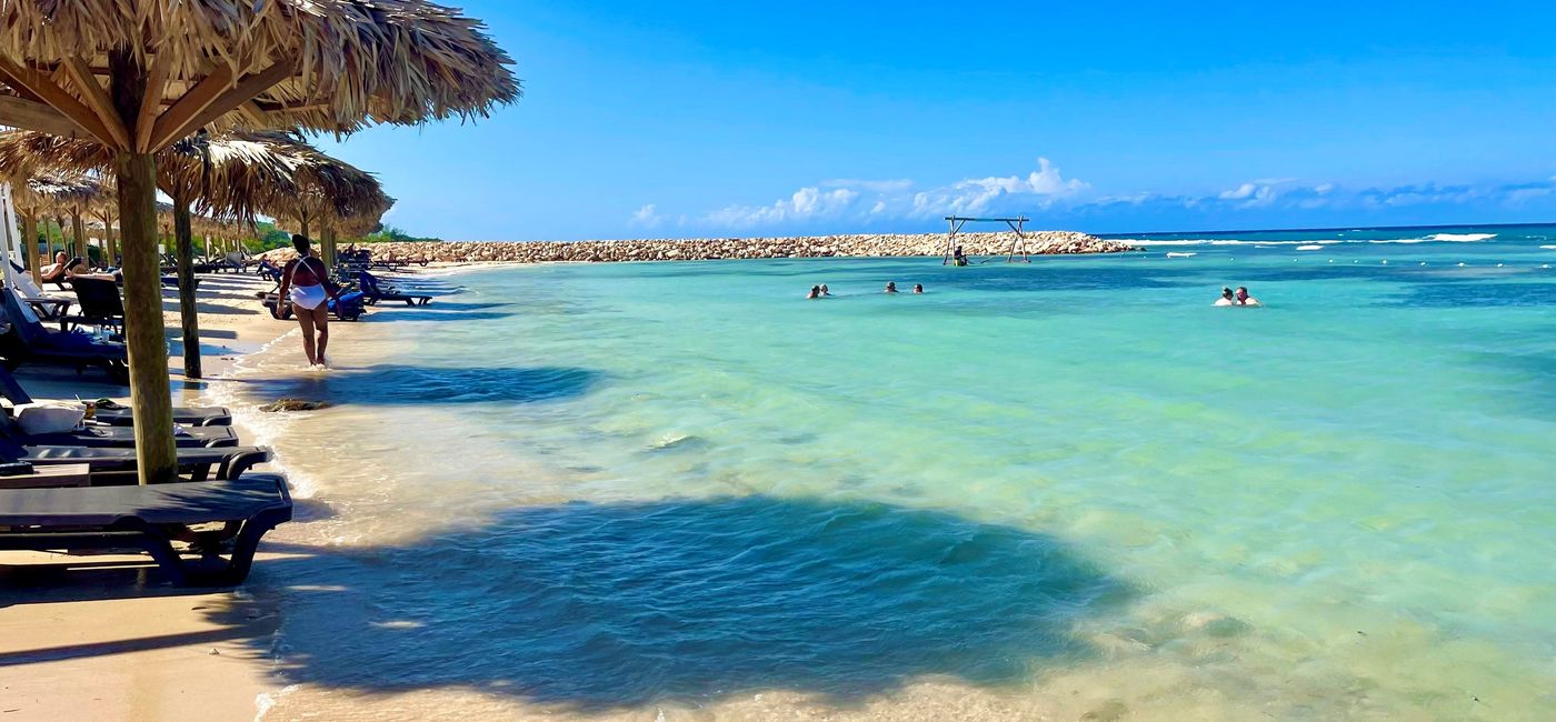Image: Tourists enjoying the beach at Ocean Coral Spring. (photo by Codie Liermann)