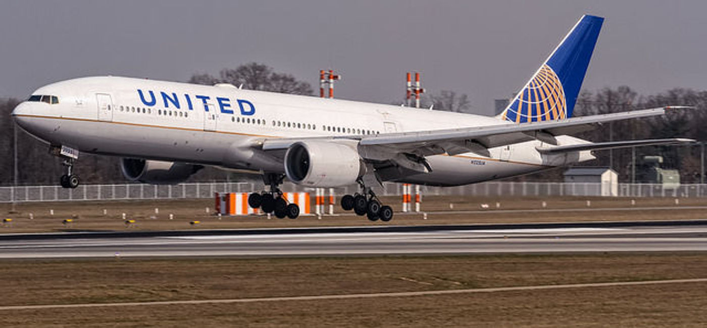 Image: PHOTO: The United Airlines Boeing 777 was diverted to Boston Logan International Airport. (photo via Flickr/Oliver Holzbauer)