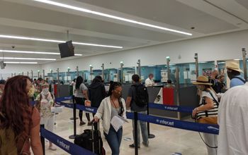 Travelers at the customs line at Cancun Airport.