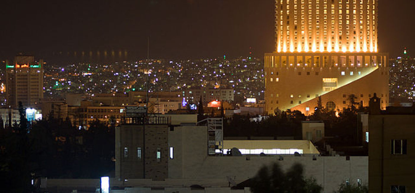 Image: PHOTO: An Amman, Jordan cityscape dominated by Le Royal Amman Hotel. (photo via Wikimedia Commons/David Bjorgen)