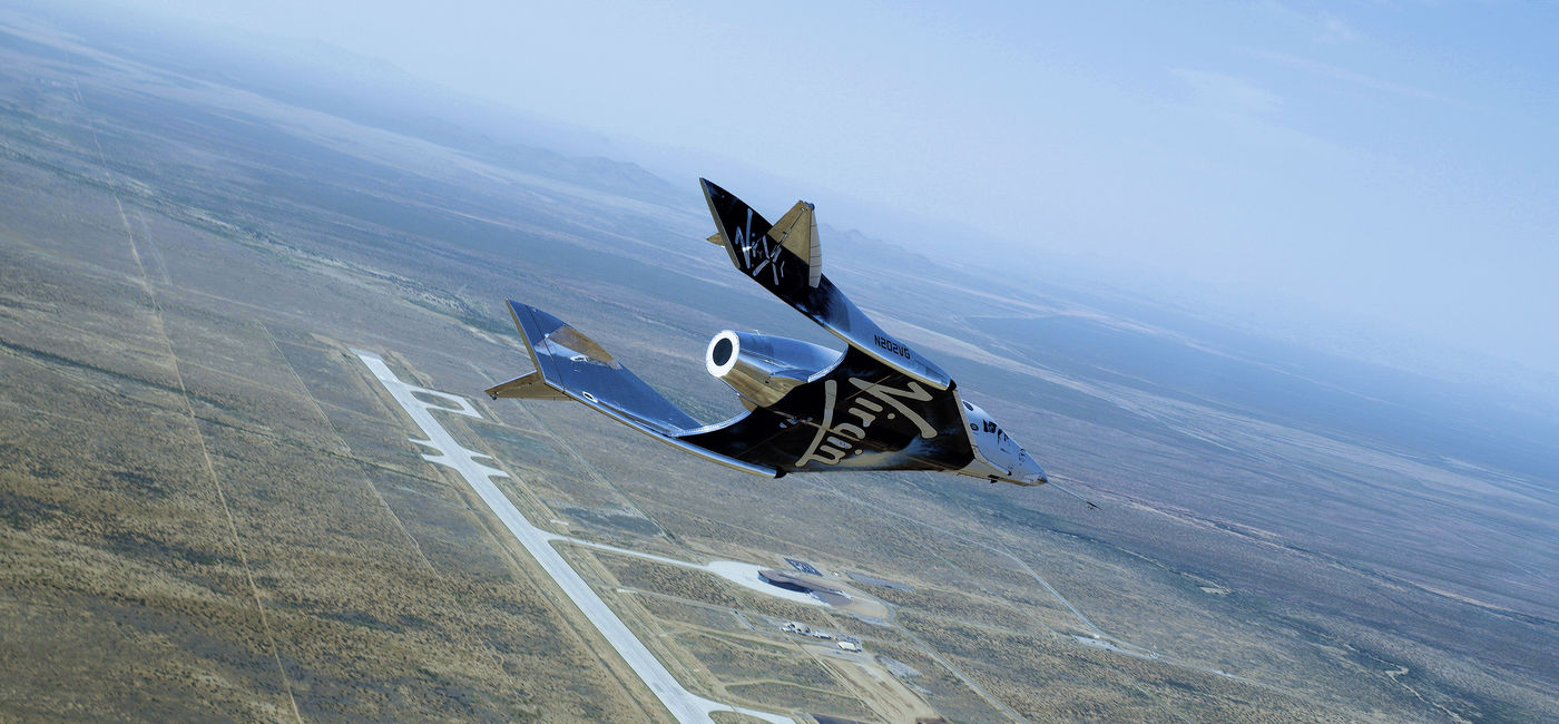 Image: PHOTO: Virgin Galactic spaceship flying over New Mexico. (Courtesy of Virgin Galactic)