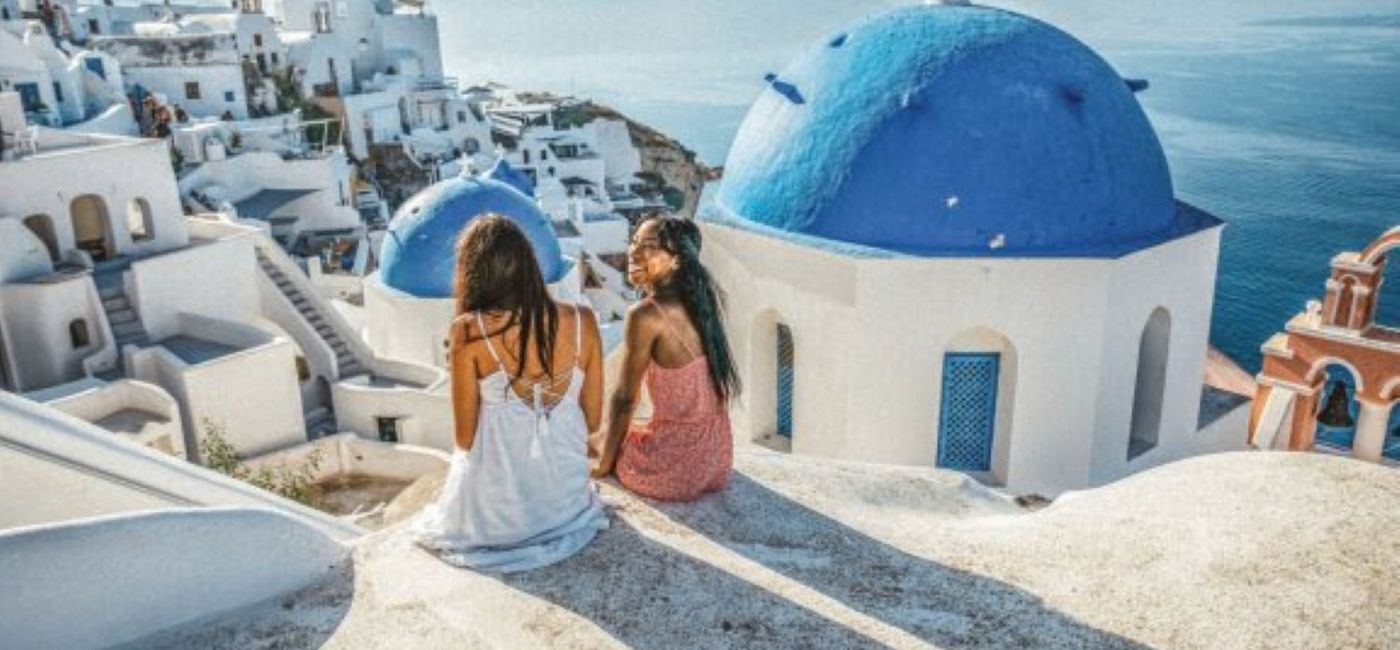 Image: Two women enjoying Greece on a Contiki trip. (photo via Contiki) ((photo via Contiki))