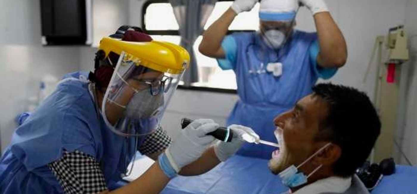 Image: Man gets COVID test. (Photo: Express News)