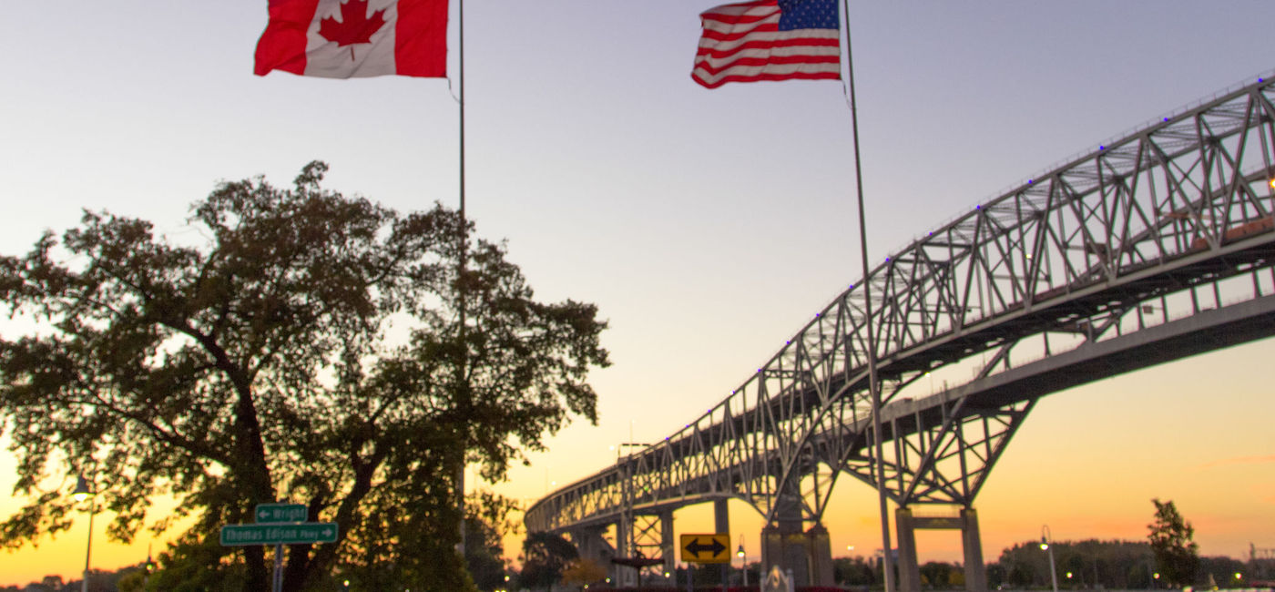 Image: International Blue Water Bridge Crossing Between Port Huron Michigan And Sarnia Ontario. (photo via ehrlif / iStock / Getty Images Plus)
