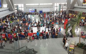 Passengers at the check-in counters inside of Ninoy Aquino International Airport in Manila, Philippines