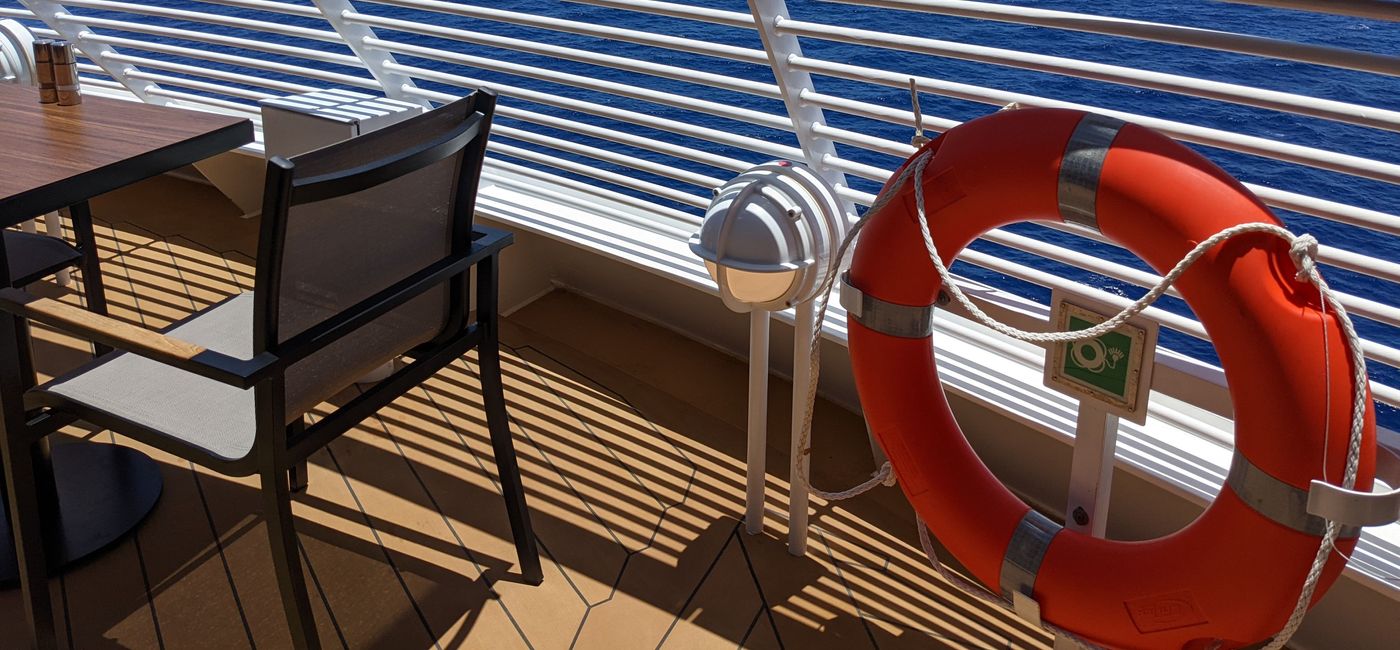 Image: Chair and table on a cruise ship deck (photo by Eric Bowman)