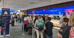 Baggage line at the airport, check bags, air travel, crowd,
