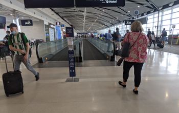 Travelers at the Detroit airport