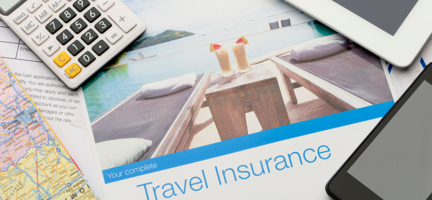 Image: Travel insurance policy documents. (Photo via iStock / Getty Images Plus / courtneyk)