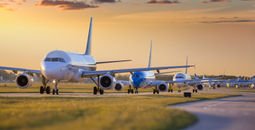 Planes waiting to take off from airport.