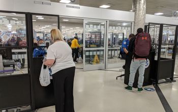Travelers check in with TSA at Atlanta Airport