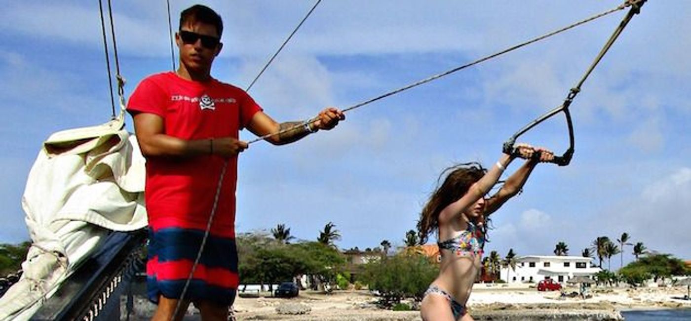 Image: PHOTO: Celebrating a daddy/daughter trip on a swing at Holiday Inn Aruba Resort. (photo by Bruce Northam)