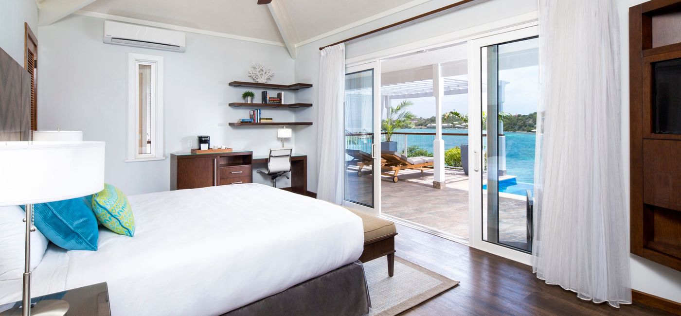Image: PHOTO: A Hammock Cove Resort and Spa bedroom in Antigua. (photo via Elite Island Resorts)