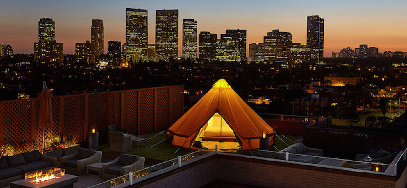Image: PHOTO: The Beverly Wilshire's new glamping experience features a massive tent with a chandelier and 270-degree views of the Hollywood Hills, among other glamorous details. (photo courtesy of Beverly Wilshire)