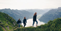 Travelers hiking above Lake Lugano in the Alps, alps, europe, lake lugano, hiking, traveler, travelers