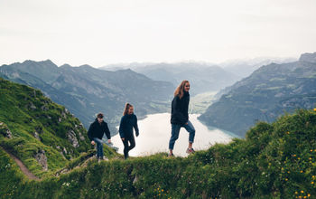 Travelers hiking above Lake Lugano in the Alps, alps, europe, lake lugano, hiking, traveler, travelers