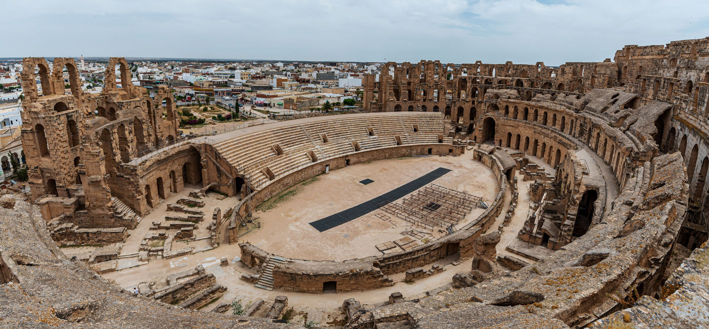 Image: The Roman amphitheater overlooks the city of El Djem, in Tunisia. (photo via Mindaugas Dulinskas / iStock / Getty Images Plus) ((photo via Mindaugas Dulinskas / iStock / Getty Images Plus))