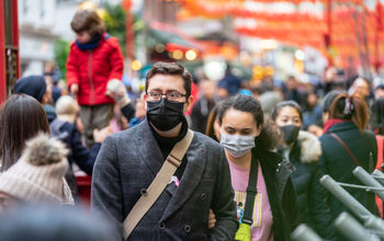 Travelers wearing masks amid the coronavirus outbreak in China