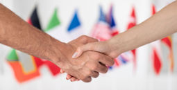 hands, shake, handshakes, agreements, flags, CBI, citizenship by investment, golden passports
