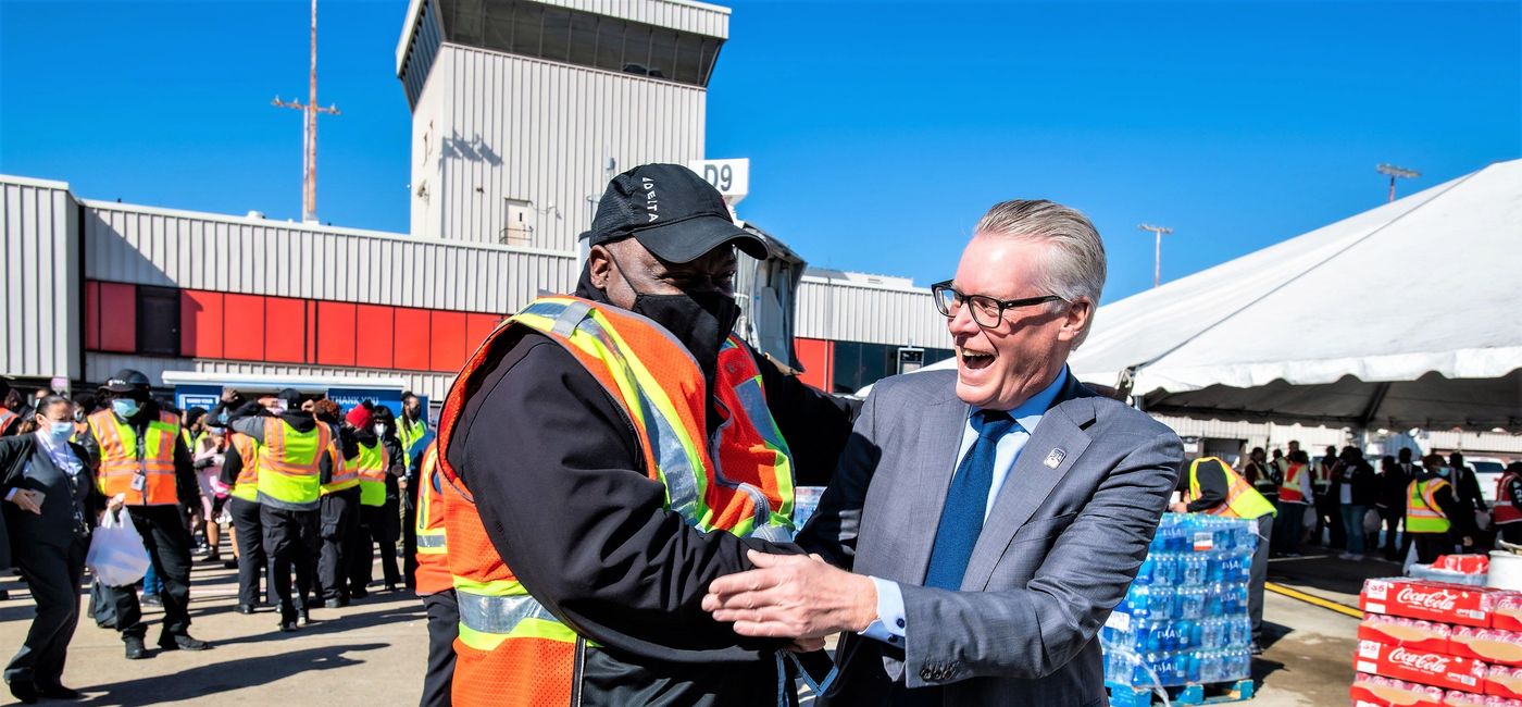 Image: Delta Airlines CEO Ed Bastian greets a ground worker on Monday during Employee Appreciation Day. (Phot by Delta Air Lines)