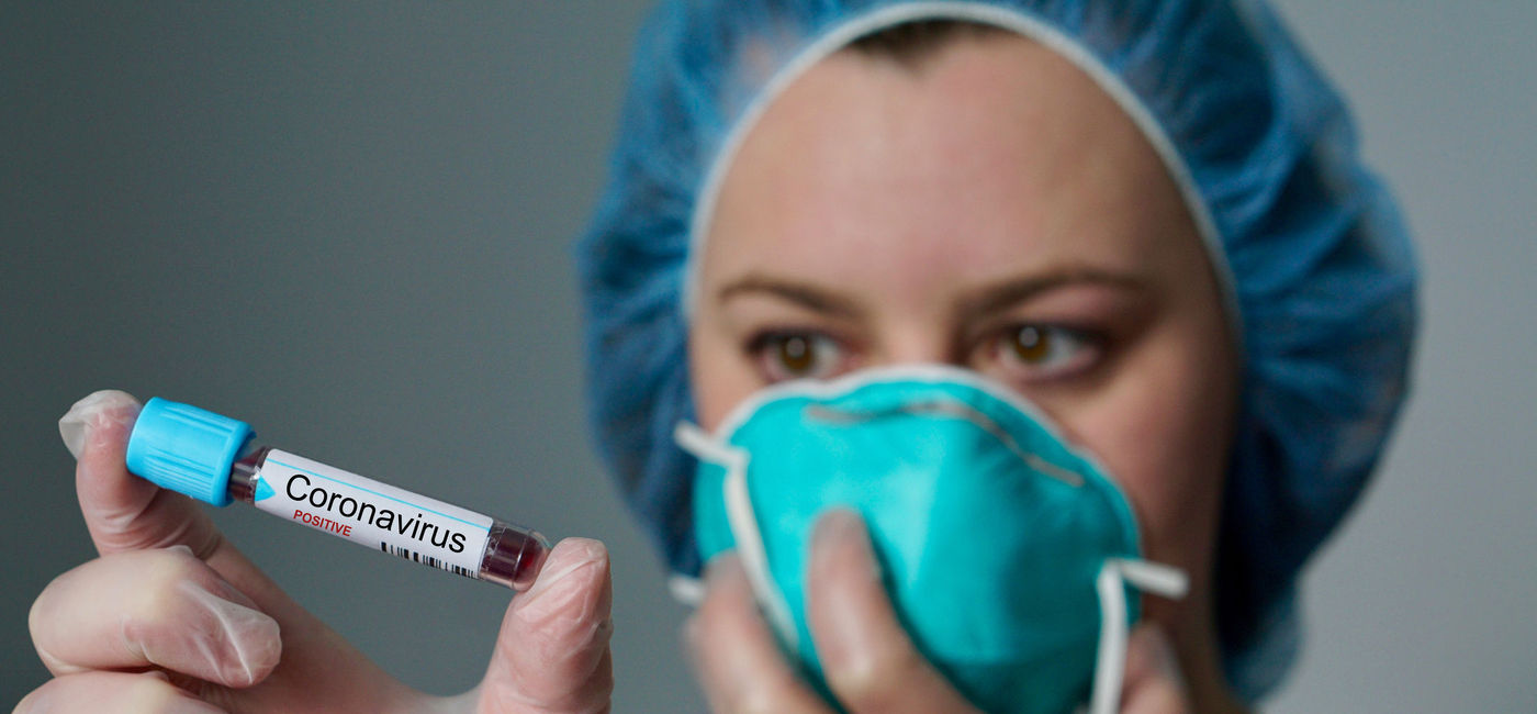 Image: PHOTO: Nurse holding a coronavirus-positive test tube. (Photo via iStock/Getty Images Plus/Samara Heisz)