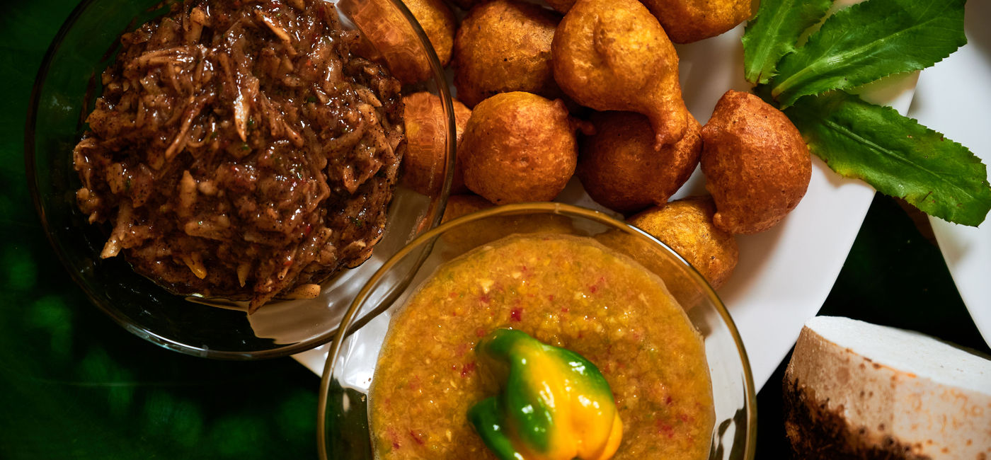 Image: Pholourie made with dasheen flour, mango amchar and pepper sauce for dip (Courtesy of Tobago Tourism)
