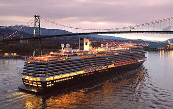 Koningsdam passes under the Lion's Gate Bridge.