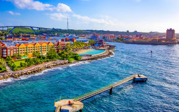 A beautiful bay with colorful architecture in Curacao, one of the Lesser Antilles islands in the Caribbean Sea.