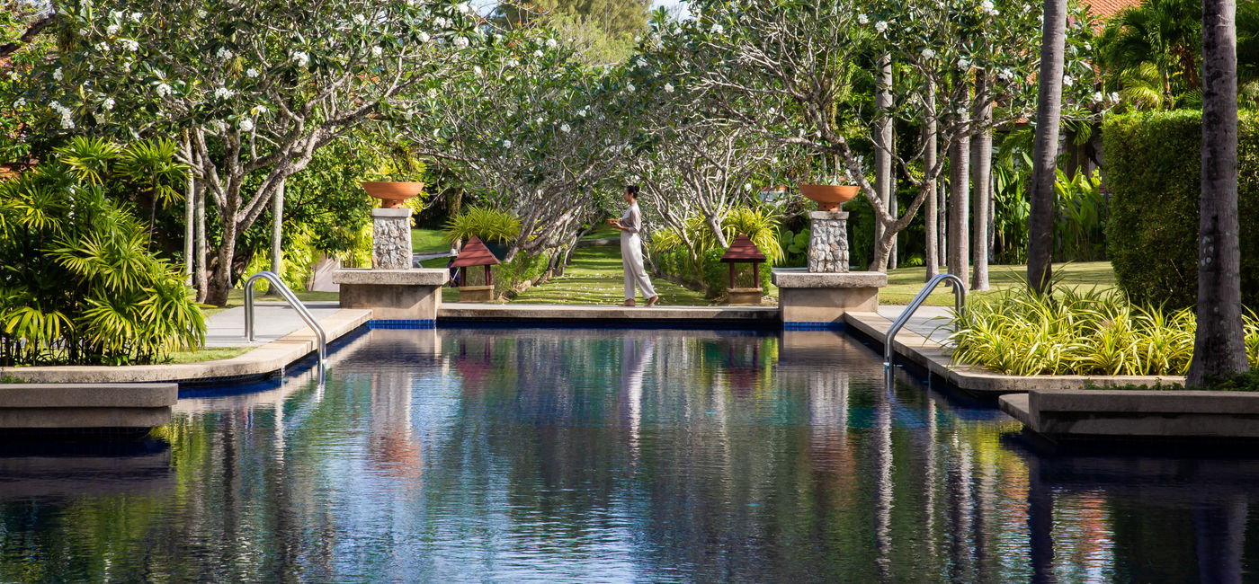 Image: A woman walks along a pool at the new Banyan Tree Veya Phuket. (photo via Banyan Tree Group) ((photo via Banyan Tree Group))