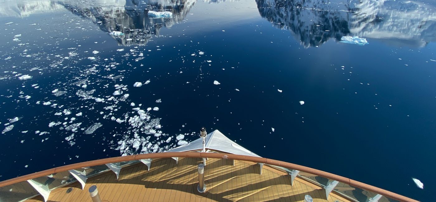 Image: Sailing through Lemaire Channel, Antarctica on the Greg Mortimer. (photo via Aurora Expeditions)