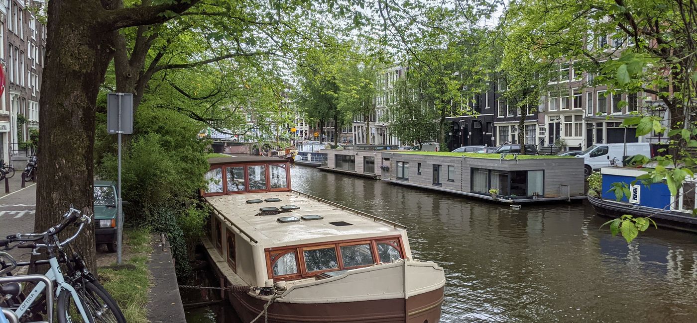 Image: House boats in Amsterdam's canal (photo by Lauren Bowman)