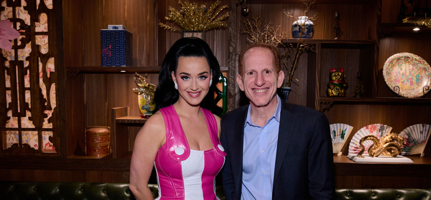 Image: Pop superstar Katy Perry, godmother of Norwegian Prima, with NCL President and CEO Harry Sommer. (Photo via Norwegian Cruise Line)