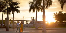 Couple enjoying a sunset in Fort Myers’ islands, beaches and neighborhoods.