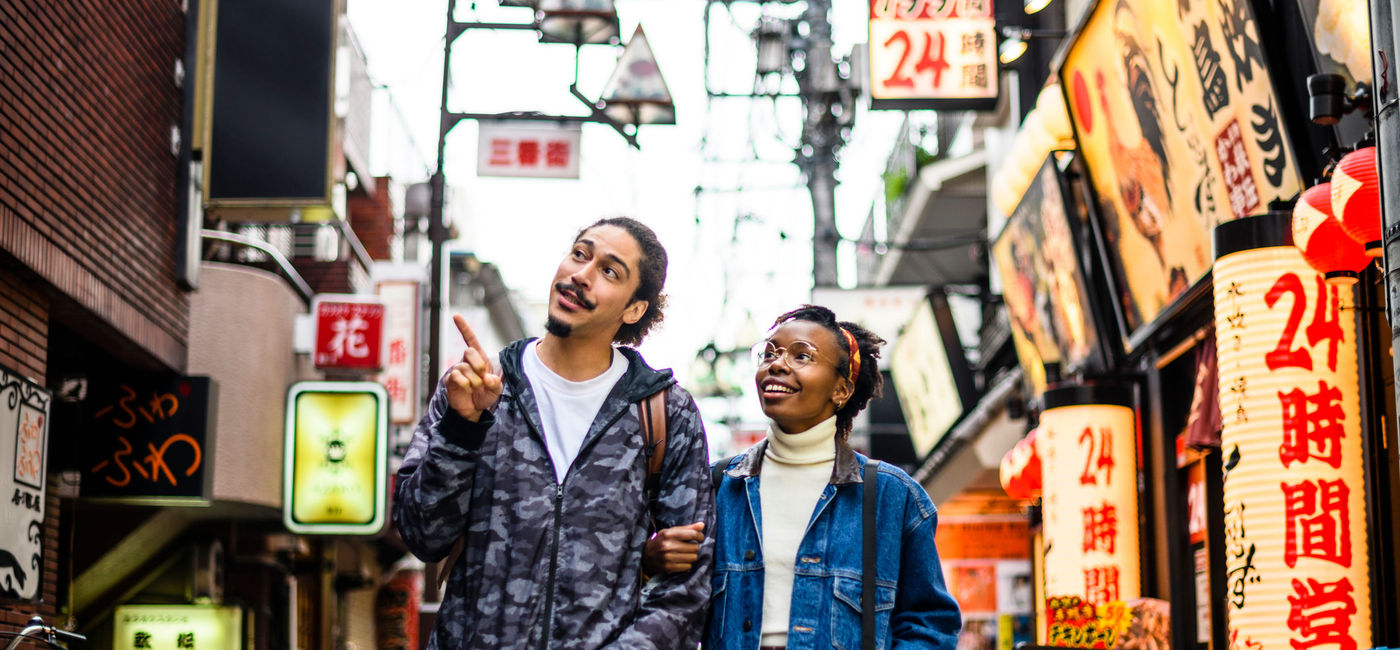 Image: Couple vacationing in Tokyo, Japan. (Photo Credit: JohnnyGreig/E+)