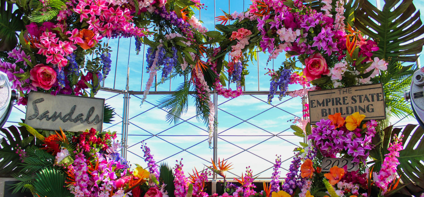 Image: An extravagant flower arrangement atop the Empire State Building, part of the Happily Ever Empire Engagement Package. (photo via Sandals Resorts) ((photo via Sandals Resorts))