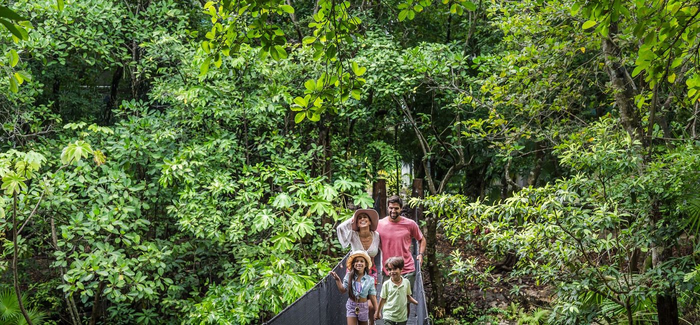 Image: A family at Sandos Caracol. (photo via Sandos Hotels & Resorts)
