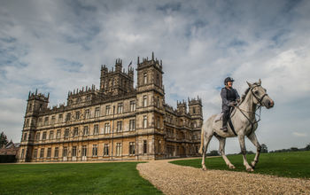 Countess of Carnarvon on horseback in front of Highclere Castle