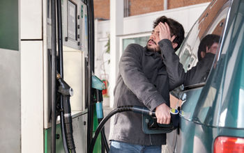 Man frustrated by the high gas prices.