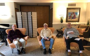 Jack Henderson, far right, with his two friends who received certificates for a bi-plane excursion