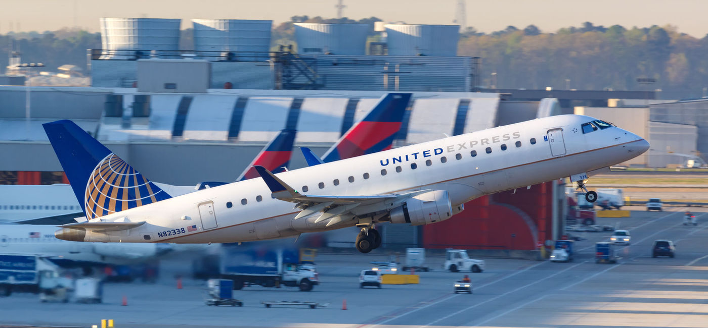 Image: PHOTO: United Express Mesa Airlines Embraer 175 airplane Atlanta airport. (photo via Boarding1Now/iStock Editorial/Getty Images Plus)
