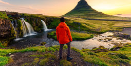 Traveler watching the sunrise in Iceland