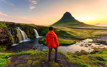 Traveler watching the sunrise in Iceland