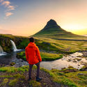 Traveler watching the sunrise in Iceland