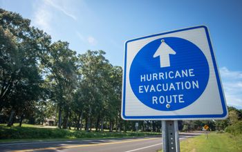 A sign directs hurricane evacuees to safety