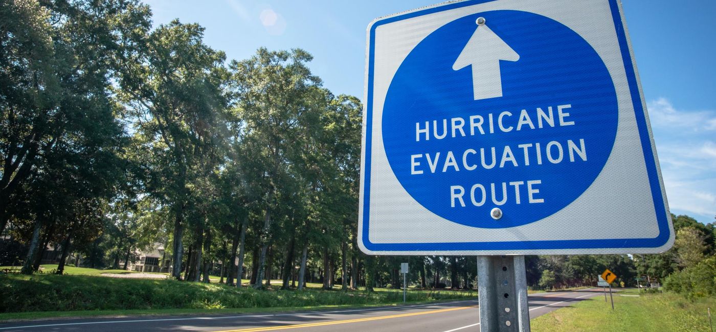 Image: A sign directs hurricane evacuees to safety. (photo via Darwin Brandis/iStock/Getty Images Plus)